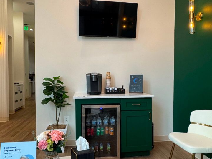 Coffee bar and comfort amenities in the LeesPike Dental waiting lounge